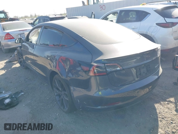 2022 Tesla Model 3 Performance with VIN 5YJ3E1EC3NF194197, listed as a IAAI auction lot 41825401 with Not Provided miles and . Bid and sale history available at DreamBid. Image 3.
