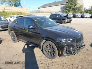 2022 BMW X4 M40i with VIN 5UX43DT00N9K31543, listed as a IAAI auction lot 40465831 with 26,426 mi miles. Bid and sale history available at carsss.com. Image 1.