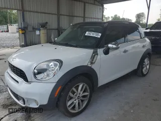 2012 MINI Countryman S z VIN WMWZC3C57CWM26631, wystawiony jako Copart lot #59210705 z przebiegiem 122 837 mil mil oraz Czysty tytuł • Clean title. Historia ofert i sprzedaży dostępna na DreamBid. Obrazek 1.