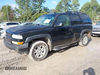 2006 Chevrolet Tahoe LT with VIN 1GNEC13Z06R167905, listed as a IAAI auction lot 40889435 with 205,472 mi miles. Bid and sale history available at carsss.com. Image 2.