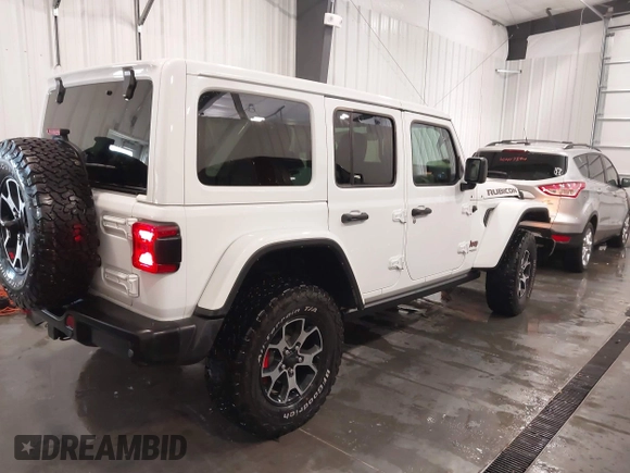 2022 Jeep Wrangler Unlimited Rubicon z VIN 1C4HJXFG7NW106446, wystawiony jako IAAI lot #41405202 z przebiegiem 39 755 mil mil oraz . Historia ofert i sprzedaży dostępna na DreamBid. Obrazek 4.
