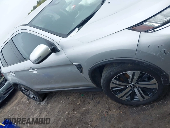 2021 Mitsubishi Outlander ES z VIN JA4ARUAU4MU025575, wystawiony jako IAAI lot #41937147 z przebiegiem 66 640 mil mil oraz . Historia ofert i sprzedaży dostępna na DreamBid. Obrazek 13.