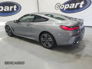 2025 BMW 8 Series 840i with VIN WBAAE4C01SCS11313, listed as a Copart auction lot 73431104 with 4,605 mi miles and Clean Title. Bid and sale history available at carsss.com. Image 2.
