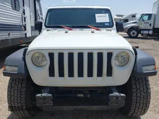 2018 Jeep Wrangler Unlimited Sport S with VIN 1C4HJXDG8JW127299, listed as a IAAI auction lot 42091561 with 116,082 mi miles and . Bid and sale history available at DreamBid. Image 12.