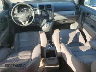 2011 Honda CR-V EX-L z VIN 5J6RE3H71BL030390, wystawiony jako Copart lot #56890475 z przebiegiem 197 742 mil mil oraz Czysty tytuł • Clean title. Historia ofert i sprzedaży dostępna na DreamBid. Obrazek 8.