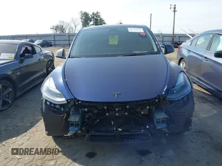 2022 Tesla Model Y Performance with VIN 7SAYGDEF7NF497076, listed as a IAAI auction lot 41759793 with 46,970 mi miles and . Bid and sale history available at DreamBid. Image 12.