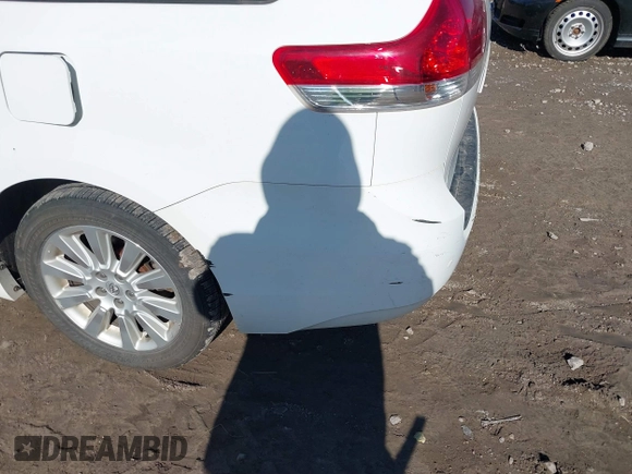 2014 Toyota Sienna Ltd with VIN 5TDDK3DC6ES076778, listed as a IAAI auction lot 41387091 with 173,497 mi miles. Bid and sale history available at carsss.com. Image 6.