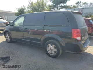 2013 Ram Cargo Van Tradesman with VIN 2C4JRGAG7DR671661, listed as a Copart auction lot 71031074 with 193,355 mi miles and Clean Title. Bid and sale history available at carsss.com. Image 2.