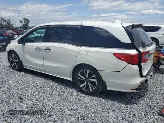 2018 Honda Odyssey Elite z VIN 5FNRL6H9XJB064148, wystawiony jako Copart lot #56214025 z przebiegiem 117 627 mil mil oraz Szkoda całkowita • Salvage title. Historia ofert i sprzedaży dostępna na DreamBid. Obrazek 2.