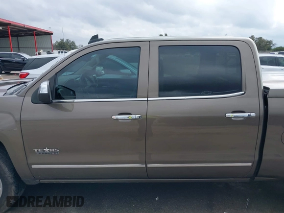 2015 Chevrolet Silverado 1500 LTZ with VIN 3GCPCSEC6FG408754, listed as a IAAI auction lot 41514369 with 140,928 mi miles and . Bid and sale history available at DreamBid. Image 14.