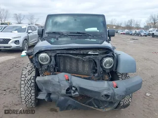 2011 Jeep Wrangler Sport with VIN 1J4AA2D1XBL634783, listed as a IAAI auction lot 41928702 with 154,379 mi miles. Bid and sale history available at carsss.com. Image 12.