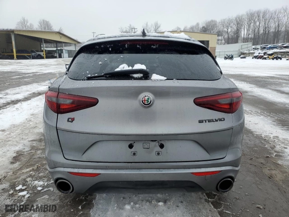 2021 Alfa Romeo Stelvio Ti with VIN ZASPAKBN9M7D20776, listed as a Copart auction lot 43731165 with 63,995 mi miles and Salvage Title. Bid and sale history available at carsss.com. Image 6.