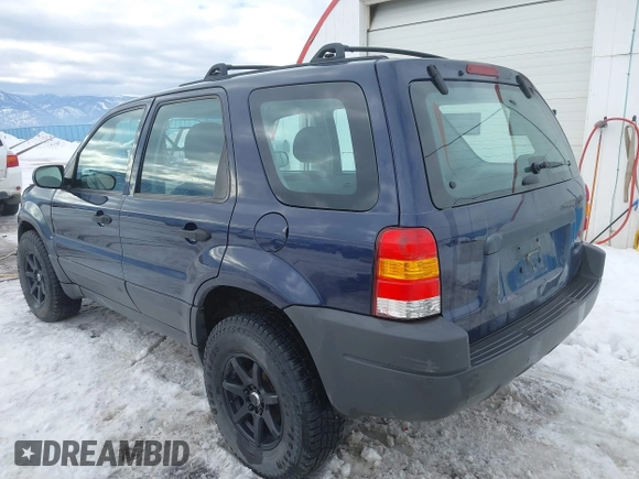 2003 Ford Escape XLS Popular with VIN 1FMYU92153KE01890, listed as a IAAI auction lot 41605087 with 109,411 mi miles. Bid and sale history available at carsss.com. Image 3.