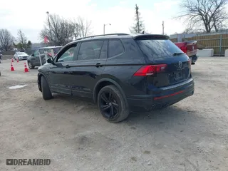 2023 Volkswagen Tiguan SE R-Line Black with VIN 3VV8B7AX4PM019421, listed as a IAAI auction lot 41885691 with 36,332 mi miles. Bid and sale history available at carsss.com. Image 3.
