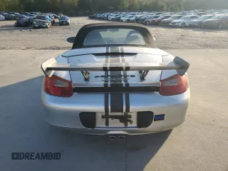 1998 Porsche Boxster с VIN WP0CA2987WS620369, выставлен на аукционе Copart как лот 81003964 с пробегом Не указан миль и Списание • Salvage title. История ставок и продаж доступна на DreamBid. Изображение 6.