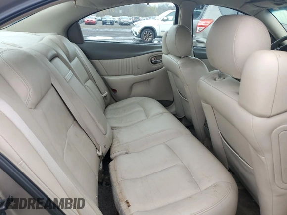 2003 Oldsmobile Aurora z VIN 1G3GS64C634172689, wystawiony jako Copart lot #53205495 z przebiegiem 91 495 mil mil oraz Czysty tytuł • Clean title. Historia ofert i sprzedaży dostępna na DreamBid. Obrazek 10.