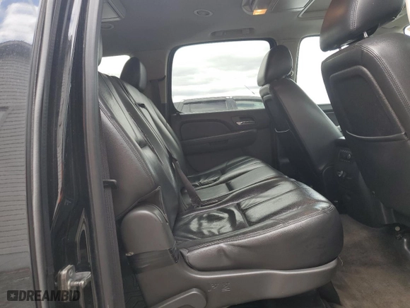 2013 Chevrolet Suburban LT with VIN 1GNSCJE02DR359695, listed as a Copart auction lot 49069875 with 341,508 mi miles and Clean Title. Bid and sale history available at carsss.com. Image 11.