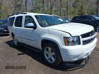 2013 Chevrolet Tahoe LTZ with VIN 1GNSKCE08DR161606, listed as a IAAI auction lot 41984912 with 189,181 mi miles and . Bid and sale history available at DreamBid. Image 1.
