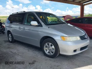 2003 Honda Odyssey EX-L z VIN 5FNRL18933B087714, wystawiony jako IAAI lot #42510813 z przebiegiem 145 360 mil mil oraz . Historia ofert i sprzedaży dostępna na DreamBid. Obrazek 1.