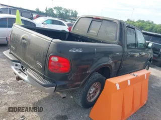 2001 Ford F-150 XLT with VIN 1FTRW08L61KD90032, listed as a IAAI auction lot 42385610 with 164,252 mi miles and . Bid and sale history available at DreamBid. Image 4.