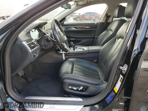 2018 BMW 7 Series 740i with VIN WBA7E2C54JG742927, listed as a Copart auction lot 70306082 with 69,735 mi miles. Bid and sale history available at carsss.com. Image 7.