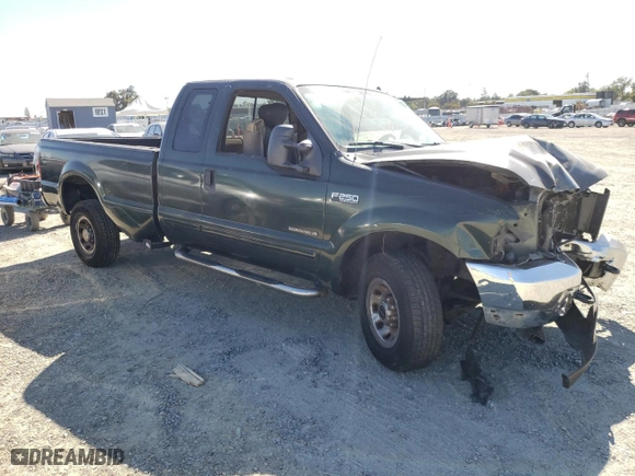 2002 Ford Super Duty F-250 XL with VIN 1FTNX21F72EB84424, listed as a Copart auction lot 70821714 with 0 mi miles and Salvage Title. Bid and sale history available at carsss.com. Image 4.