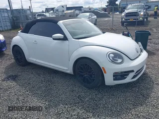2019 Volkswagen Beetle S with VIN 3VW5DAAT3KM506167, listed as a IAAI auction lot 41990431 with 44,403 mi miles and . Bid and sale history available at DreamBid. Image 1.