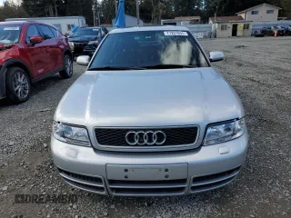2000 Audi S4 z VIN WAUDD68D7YA179687, wystawiony jako Copart lot #77201694 z przebiegiem 165 118 mil mil oraz Szkody całkowita. Historia ofert i sprzedaży dostępna na DreamBid. Obrazek 5.