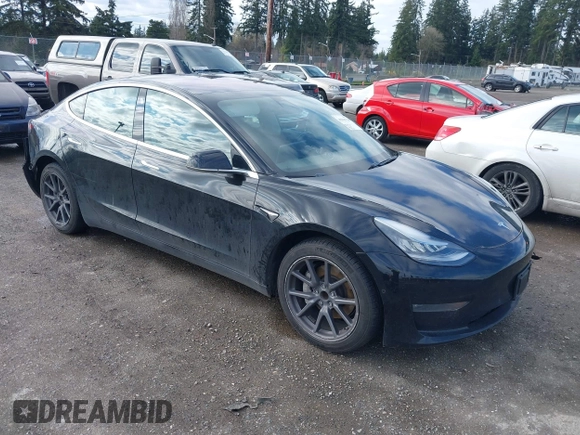 2019 Tesla Model 3 Mid Range with VIN 5YJ3E1EA4KF305611, listed as a IAAI auction lot 41916738 with 59,101 mi miles and . Bid and sale history available at carsss.com. Image 1.