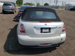 2014 MINI Convertible z VIN WMWZN3C55ET861050, wystawiony jako Copart lot #60014125 z przebiegiem 101 524 mil mil oraz Czysty tytuł • Clean title. Historia ofert i sprzedaży dostępna na DreamBid. Obrazek 6.