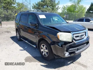 2011 Honda Pilot Touring z VIN 5FNYF4H97BB021458, wystawiony jako IAAI lot #42289495 z przebiegiem 117 407 mil mil oraz . Historia ofert i sprzedaży dostępna na DreamBid. Obrazek 1.