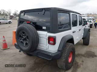 2023 Jeep Wrangler Sport S with VIN 1C4HJXDG0PW638871, listed as a IAAI auction lot 42129295 with 16,171 mi miles and . Bid and sale history available at DreamBid. Image 4.