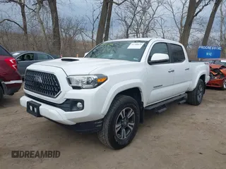 2018 Toyota Tacoma SR5 with VIN 3TMDZ5BN9JM051105, listed as a IAAI auction lot 41708034 with 98,000 mi miles and . Bid and sale history available at DreamBid. Image 17.