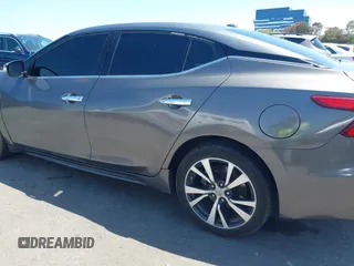 2018 Nissan Maxima Platinum z VIN 1N4AA6AP1JC388815, wystawiony jako IAAI lot #42098902 z przebiegiem 80 677 mil mil oraz . Historia ofert i sprzedaży dostępna na DreamBid. Obrazek 19.