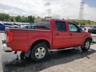2006 Nissan Frontier LE with VIN 1N6AD07W76C460568, listed as a Copart auction lot 62859015 with 145,127 mi miles and Salvage title. Bid and sale history available at DreamBid. Image 3.