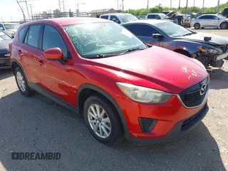 2014 Mazda CX-5 Sport with VIN JM3KE2BE8E0375485, listed as a IAAI auction lot 42074587 with 152,944 mi miles and . Bid and sale history available at DreamBid. Image 1.