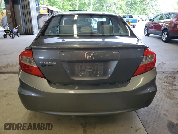 2012 Honda Civic LX z VIN 2HGFB2F59CH313357, wystawiony jako Copart lot #59526905 z przebiegiem 253 322 mil mil oraz Czysty tytuł • Clean title. Historia ofert i sprzedaży dostępna na DreamBid. Obrazek 6.
