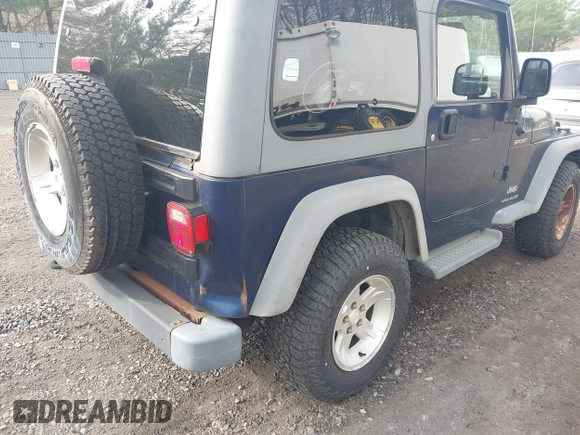 2005 Jeep Wrangler Sport z VIN 1J4FA49S25P302627, wystawiony jako IAAI lot #42100601 z przebiegiem 169 650 mil mil oraz . Historia ofert i sprzedaży dostępna na DreamBid. Obrazek 6.
