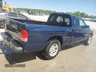 2001 Dodge Dakota z VIN 1B7GL22X91S338711, wystawiony jako Copart lot #54914095 z przebiegiem 200 216 mil mil oraz Szkoda całkowita • Salvage title. Historia ofert i sprzedaży dostępna na DreamBid. Obrazek 3.
