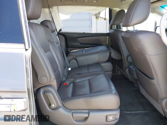 2012 Honda Odyssey Touring with VIN 5FNRL5H98CB011297, listed as a IAAI auction lot 42207061 with 154,073 mi miles and . Bid and sale history available at DreamBid. Image 8.
