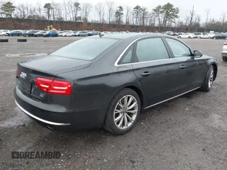 2012 Audi A8 L with VIN WAURVAFD7CN011767, listed as a IAAI auction lot 41848096 with 98,397 mi miles. Bid and sale history available at carsss.com. Image 4.