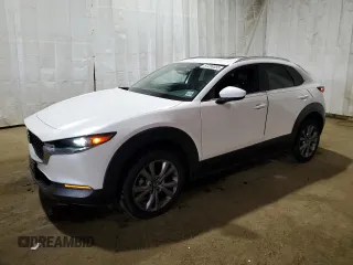 2024 Mazda CX-30 S Preferred with VIN 3MVDMBCM0RM706927, listed as a Copart auction lot 57299555 with 2,972 mi miles and Salvage title. Bid and sale history available at DreamBid. Image 1.