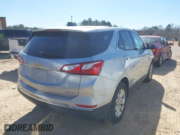 2019 Chevrolet Equinox LT with VIN 2GNAXUEV0K6285473, listed as a IAAI auction lot 41772103 with 59,268 mi miles and . Bid and sale history available at carsss.com. Image 4.
