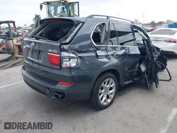 2013 BMW X5 xDrive35i z VIN 5UXZV4C57D0E04976, wystawiony jako IAAI lot #42111435 z przebiegiem 160 226 mil mil oraz . Historia ofert i sprzedaży dostępna na DreamBid. Obrazek 4.