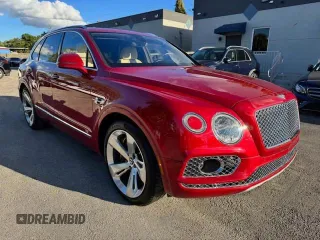 2017 Bentley Bentayga W12 z VIN SJAAC2ZV1HC014037, wystawiony jako Copart lot #54799655 z przebiegiem 36 099 mil mil oraz Szkody całkowita. Historia ofert i sprzedaży dostępna na DreamBid. Obrazek 4.