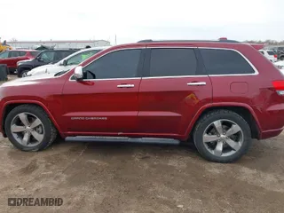 2014 Jeep Grand Cherokee Overland with VIN 1C4RJFCM0EC492833, listed as a IAAI auction lot 41836579 with 120,168 mi miles. Bid and sale history available at carsss.com. Image 14.