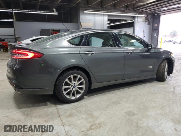 2017 Ford Fusion Titanium z VIN 3FA6P0SU3HR209563, wystawiony jako Copart lot #52039915 z przebiegiem 119 961 mil mil oraz Szkoda całkowita • Salvage title. Historia ofert i sprzedaży dostępna na DreamBid. Obrazek 3.