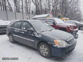 2003 Honda Civic LX with VIN 2HGES16573H580020, listed as a IAAI auction lot 41334940 with 173,595 mi miles. Bid and sale history available at carsss.com. Image 1.