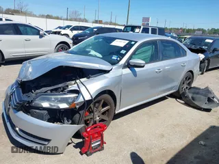 2015 Volkswagen Passat 1.8T Limited Edition with VIN 1VWAT7A30FC014689, listed as a IAAI auction lot 41758748 with 140,545 mi miles. Bid and sale history available at carsss.com. Image 2.