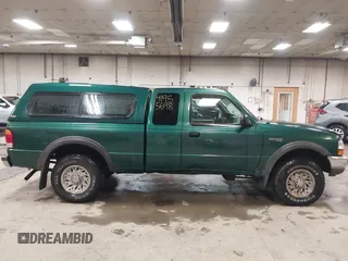 1999 Ford Ranger XL with VIN 1FTZR15V3XTA98120, listed as a IAAI auction lot 41955698 with 197,733 mi miles. Bid and sale history available at carsss.com. Image 14.
